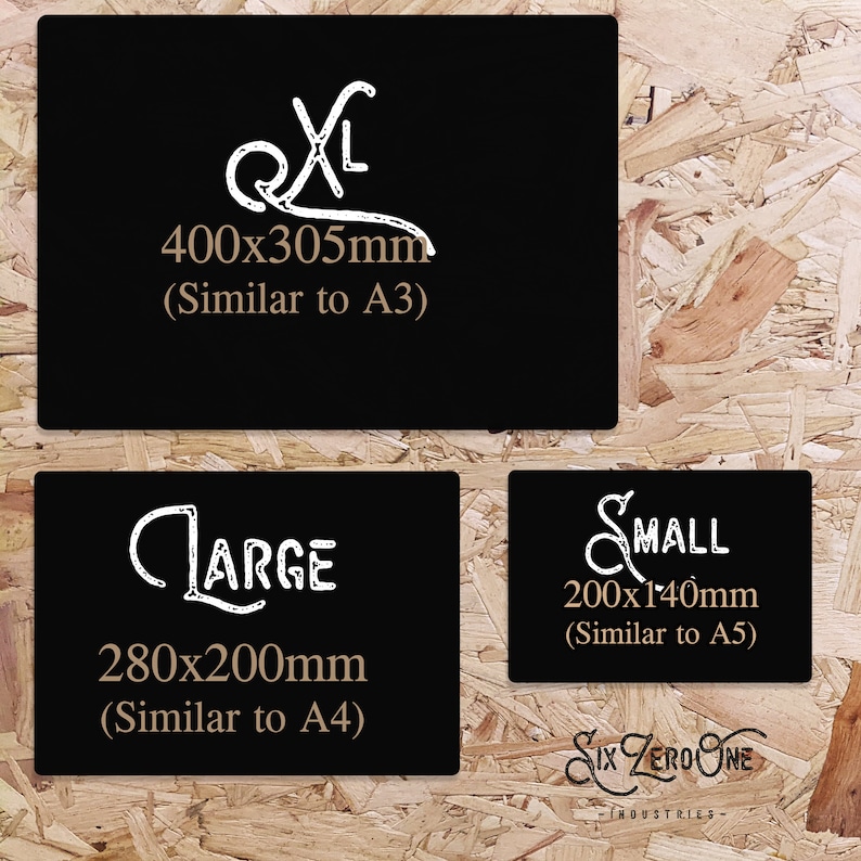 May include: Three black rectangular signs with white text and measurements. The largest sign reads "XL" and "400x305mm (Similar to A3)". The middle sign says "LARGE" and "280x200mm (Similar to A4)". The smallest sign says "SMALL" and "200x140mm (Similar to A5)".