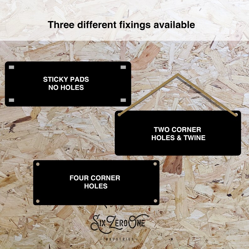 May include: Three different ways to hang a sign: sticky pads with no holes, two corner holes with twine, or four corner holes. The sign is black with white text.