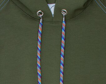 Regenboogbedels schoen en hoodie: sportkoordset