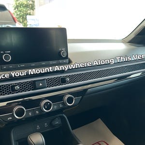 2023+ Honda CR-V MagSafe phone mount installed on dashboard honeycomb vent for 6th generation CR-V models 2023 2024 2025 2026. Custom vent phone holder with ultra strong MagSafe magnet for secure hands-free driving. Honda CRV phone mount compatible with iPhone 12 13 14 15 16 and Android using MagSafe ring. Adjustable CR-V dashboard phone holder for driver and passenger use, no tools or adhesive required.
