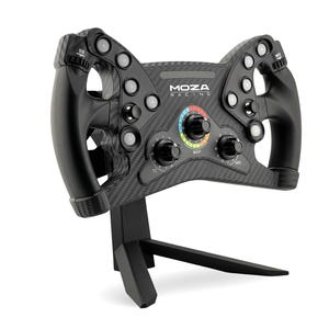 May include: Black racing steering wheel with carbon fiber accents and multiple buttons, knobs, and a display. The steering wheel is mounted on a black stand.