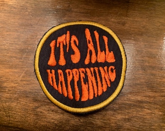 Bijna beroemde tribute-patch It's All Happening