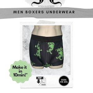 May include: Black boxer shorts with a green dragon pattern. The waistband is black. The image includes text that says "MEN BOXERS UNDERWEAR" and "Make it in 10min!". Sizes available are XS-2XL.