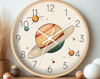 Reloj de pared con forma de planeta: decoración espacial para la habitación infantil.