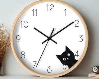 Reloj de pared con forma de gato: decoración original para amantes de los gatos.