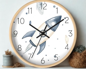 Reloj de pared con cohete: reloj silencioso con temática espacial, ideal para decorar la habitación de un niño o la sala de juegos.