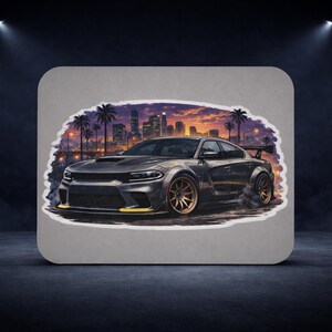 May include: A gray sports car sticker with gold rims and a rear spoiler, set against a cityscape with palm trees and a sunset. The car is depicted with smoke coming from the tires.