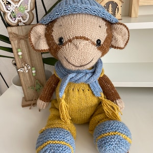 Knitted wool toy monkey