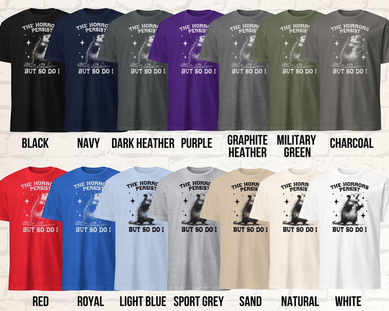 Colorchart Unisex T-Shirt mit einem schreienden Opossum im Retro Stil und der Aufschrift: The Horrors Persist But so do I.