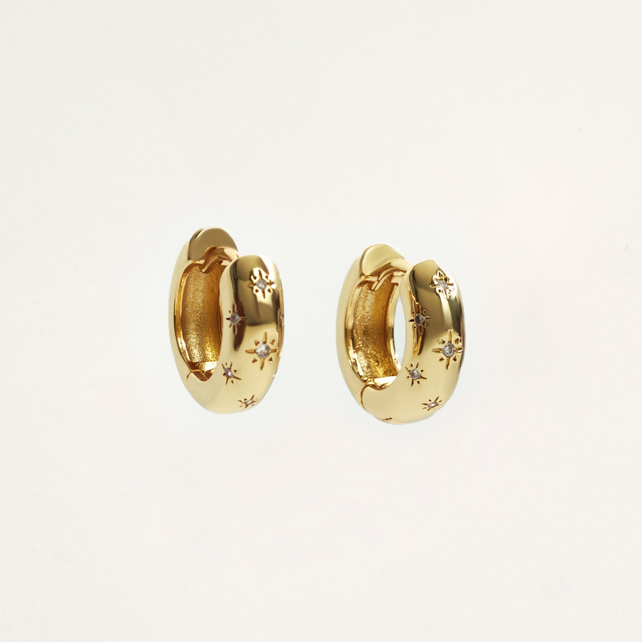Solid gold huggie earrings Etsy Nederland