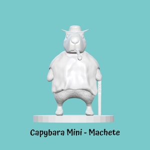 May include: White painted figurine of a capybara wearing a hat and holding a machete. The figurine is standing on a small base and the text "Capybara Mini - Machete" is printed below the base.