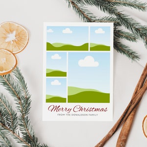 May include: A white Christmas card with a blue and green landscape design. The card reads "Merry Christmas from the Donaldson Family".