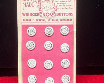 Lindner’s white handmade size 14 buttons