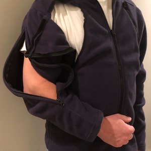 Right side of dialysis / chemo jacket with catheter / PICC line and fistula access points and adjustable tubing management system on shoulder for less strain and tugging on the access site. (Navy Blue)