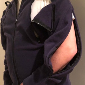 Left side of dialysis / chemo jacket with catheter / PICC line and fistula access points and adjustable tubing management system on shoulder for less strain and tugging on the access site. (Navy Blue)