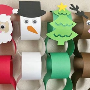May include: A festive paper chain featuring Santa Claus, a snowman, a Christmas tree, and a reindeer. The chain links are red, white, green, and brown. The Santa has a red hat and white beard. The snowman has a black hat and orange nose.