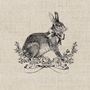 May include: A black and white illustration of a rabbit wearing a bow tie and sitting on a bed of roses. The rabbit is surrounded by greenery and a ribbon with a scroll.