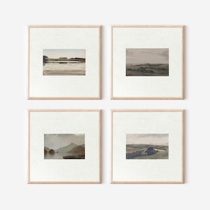 Puede incluir: Cuatro impresiones artísticas de paisajes enmarcadas. Cada impresión presenta una escena de acuarela apagada de un paisaje natural. Los marcos son de color madera clara y las impresiones están montadas sobre papel blanco texturizado.