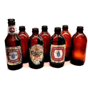 Vintage amber beer bottles,  set of 7, collectible bottles, brown beer bottles, Molson and Carlsberg beer bottles.
