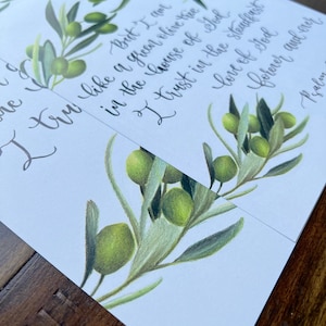 May include: A white card with a green olive branch illustration and the text "But I am a great olive tree in the house of God. I trust in the steadfast love of God forever and ever. Psalm"