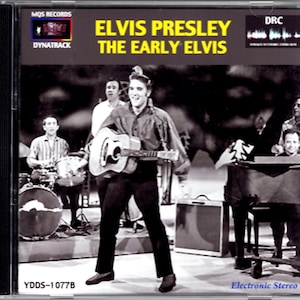 Peut inclure: Photographie en noir et blanc d'Elvis Presley se produisant sur scène avec un groupe. Il joue de la guitare acoustique et chante dans un microphone. La pochette de l'album est intitulée "Elvis Presley The Early Elvis" et porte la mention "Electronic Stereo" en bas.