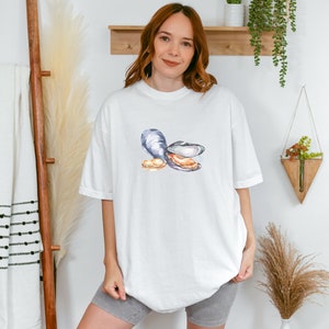 Camiseta gráfica Oyster: Camisa unisex con colores cómodos