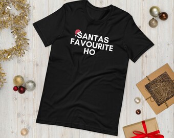 May include: Black t-shirt with white text that reads "Santas Favourite Ho" and a small red Santa hat graphic above the text.