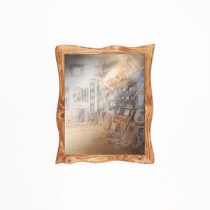 May include: A rectangular wall mirror featuring a natural light brown wooden frame with an organic, wavy, and uneven edge design. The reflective glass surface displays a clear interior view of a room filled with various framed artwork and decor.