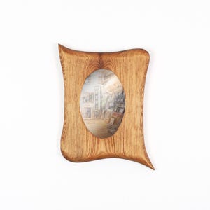 Ovaler Holzspiegel – kleiner Spiegel mit rustikalem Holzrahmen aus Kiefer 10x15 cm, handgefertigtes Naturholz Unikat mit organischer Form Naturfarben dunkel