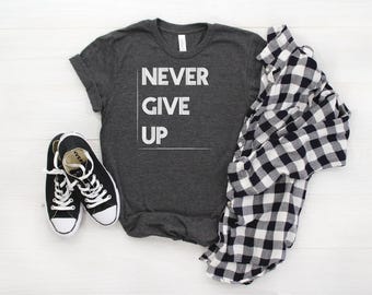 Never Give Up Shirt: Motivational Graphic Tee