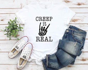 Creep It Real Halloween Shirt: Skeleton Hand Fall Tee