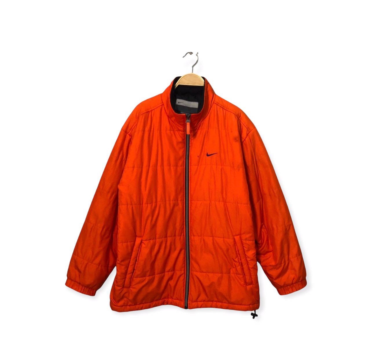 Nike store orange jacket