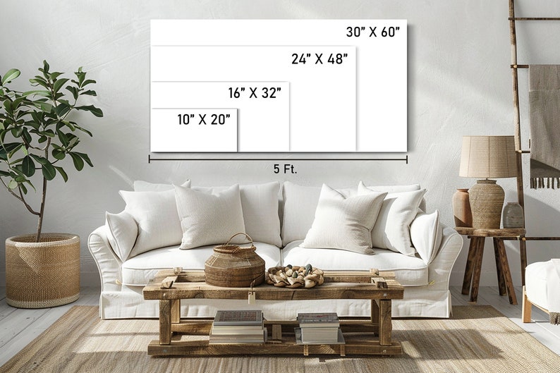 Puede incluir: Un sof&aacute; blanco con almohadas se encuentra frente a una pared blanca con cinco lienzos blancos de diferentes tama&ntilde;os colgados en la pared. Los lienzos est&aacute;n etiquetados con sus dimensiones en pulgadas. El lienzo m&aacute;s grande es de 30 pulgadas por 60 pulgadas, el siguiente m&aacute;s grande es de 24 pulgadas por 48 pulgadas, el siguiente es de 16 pulgadas por 32 pulgadas, el siguiente es de 10 pulgadas por 20 pulgadas y el m&aacute;s peque&ntilde;o es de 5 pies de ancho.