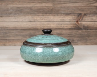 Ceramic jewelry box from black stoneware and copper green ice-crackle glaze. 14 cm wide and ~280ml