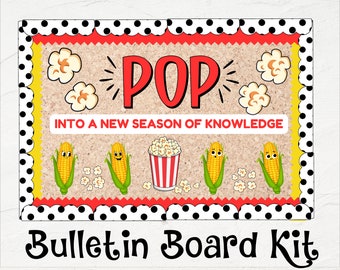 Puede incluir: Un kit de tablero de anuncios con un tema de otoño. El kit incluye un cubo de palomitas de maíz a rayas rojas y blancas, mazorcas de maíz con caras y granos de palomitas de maíz. El texto "POP into a new season of knowledge" se muestra en el tablero de anuncios.
