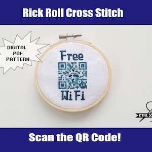 May include: A white embroidery hoop with a blue and green QR code and the text "Free Wi Fi" in black. The hoop is on a white background. The text "Scan the QR Code!" is below the hoop. The text "DIGITAL PDF PATTERN" is in a white speech bubble with a black outline. The text "CTRL X STITCH" is in a black and white logo.
