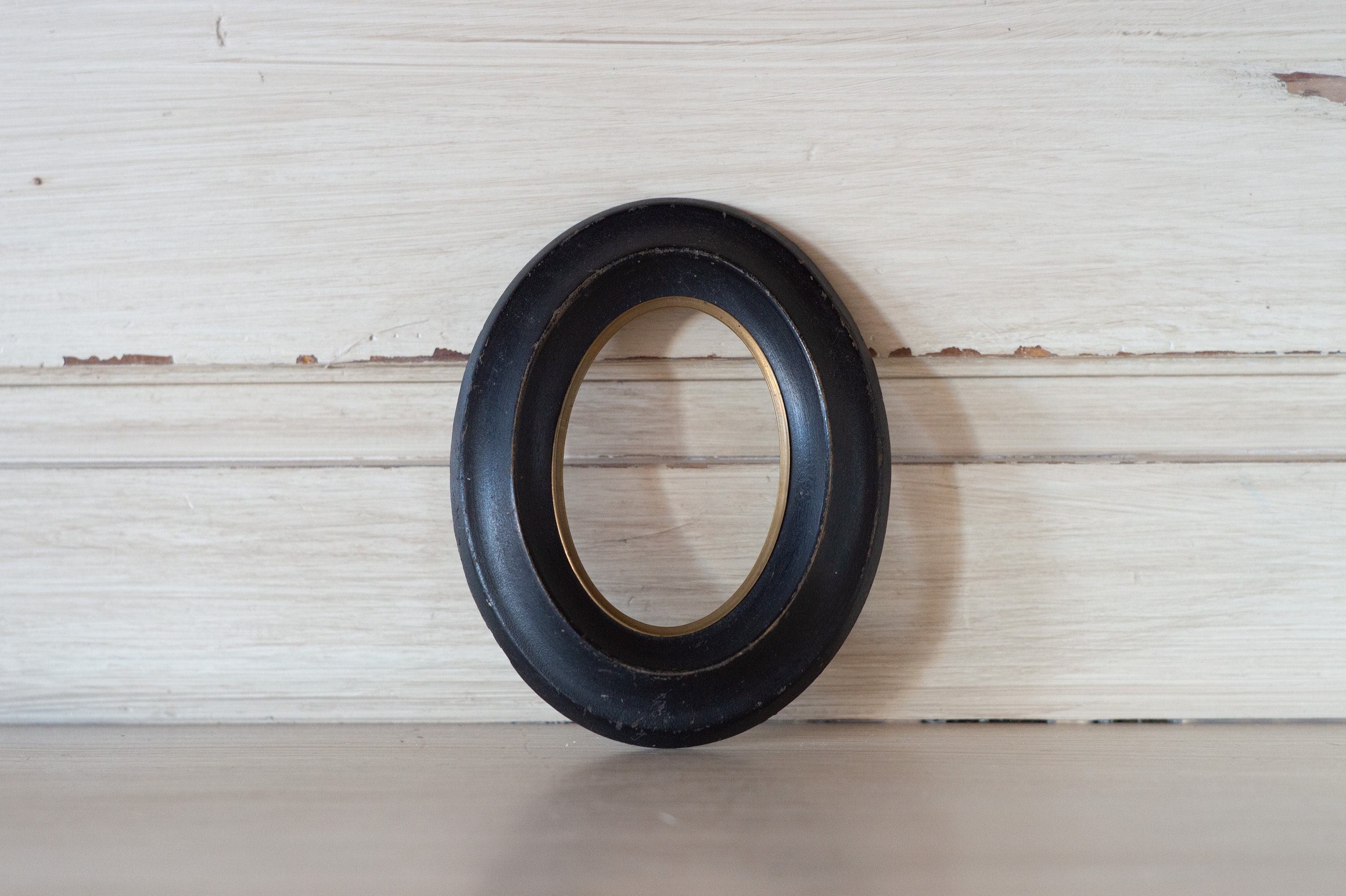 Napoleon Iii's Oval Frame in Blackened Wood With A Brass Circle