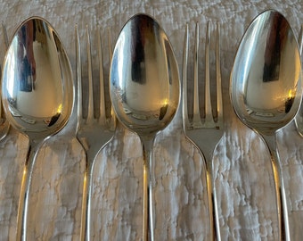 Set of 7 French vintage silverplate forks and spoons with a Louis XVI style monogram