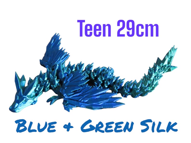May include: Blue and green origami dragon sculpture, 29 inches long.  "Teen 29cm" and "BLUE + GREEN SILK" are written in the image.