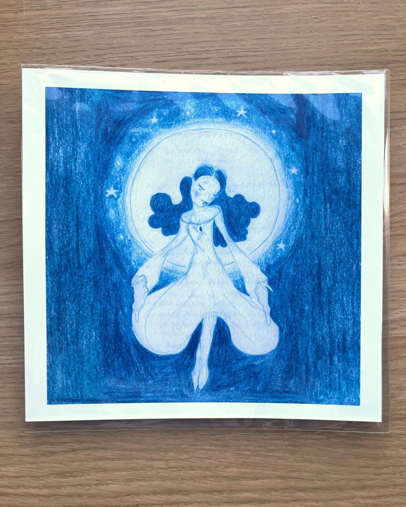 May include: A blue and white illustration of a figure in a flowing gown, set against a backdrop of a large, glowing circle and stars. The artwork is a pencil drawing, with a dreamy, ethereal quality.