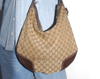 Iconic vintage Gucci GG canvas and leather Princy bag