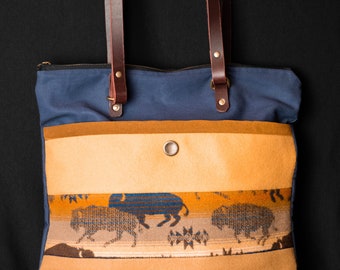 Dog-centric boutique bag. Wear as a backpack or tote with easy-shift leather straps. Made with Pendleton wool fabric.