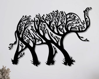 May include: A black metal elephant wall art piece. The elephant's body is formed by a tree-like design, with branches and leaves creating the shape. The artwork is mounted on a white wall above a wooden cabinet, adding a touch of nature-inspired decor.