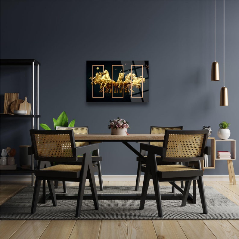 May include: A black and gold framed wall art print featuring a group of golden horses running in a black background.