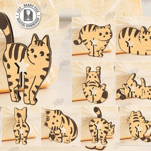 May include: A collection of ten laser-cut wooden cat designs in various poses. The cats are tan with dark brown stripes and spots. The designs include a cat standing, sitting, and lying down. The image also includes the text "CUT READY FILE" and file type options.