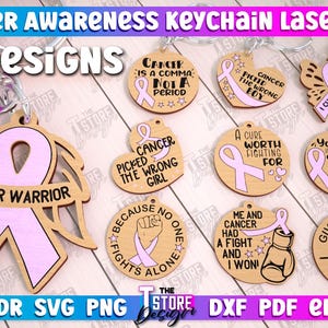 May include: Ten laser cut designs for keychains featuring pink ribbons and inspirational messages about cancer awareness. The designs include phrases like "Cancer Warrior", "Picked the Wrong Girl", "A Cure Worth Fighting For", and "Give Cancer the Boot".