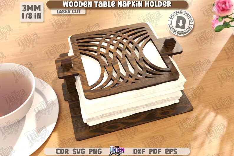 May include: A wooden table napkin holder with a laser-cut design. The holder is dark brown and holds a stack of white napkins. The text "WOODEN TABLE NAPKIN HOLDER" and "LASER CUT" are visible.