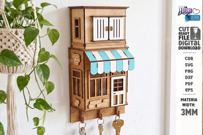 May include: A wall-mounted wooden key holder shaped like a two-story building with a light blue and white striped awning, white window shutters, a white door, and four metal hooks at the bottom for hanging keys, designed for 3mm material thickness.