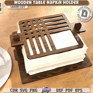 May include: Wooden table napkin holder, laser cut from 3mm (1/8 in) thick wood. The dark brown holder has a rectangular base and a slotted top, designed to hold a stack of white napkins. The image also includes the text "Wooden Table Napkin Holder".