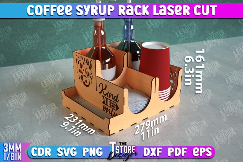 May include: Laser cut wooden syrup rack with two bottle holders, a napkin holder, and a cup holder. The rack is 9.1 inches wide, 11 inches long, and 6.3 inches tall. It has the words "Kind Vibes Only" printed on the side.
